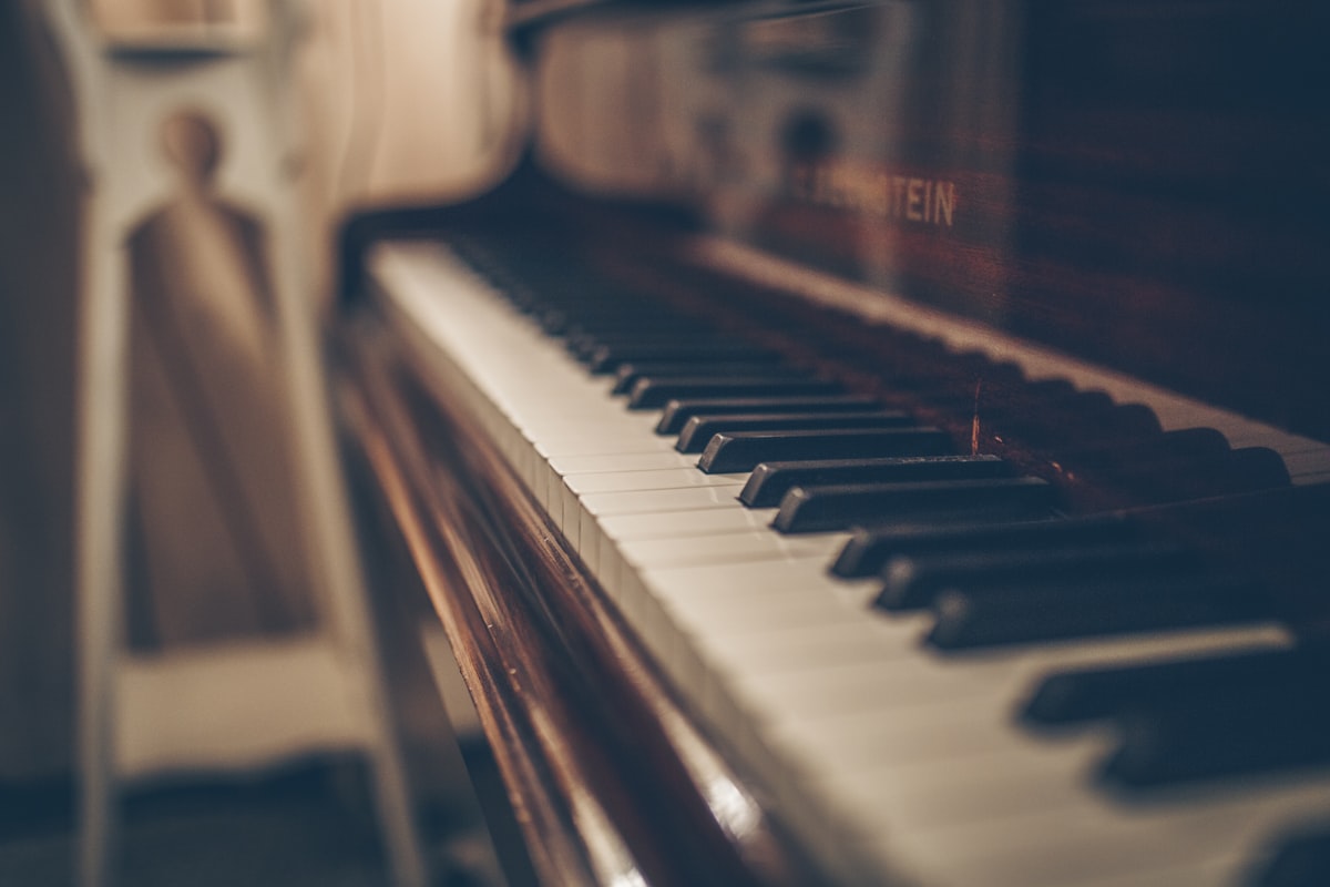 Student at a piano lesson